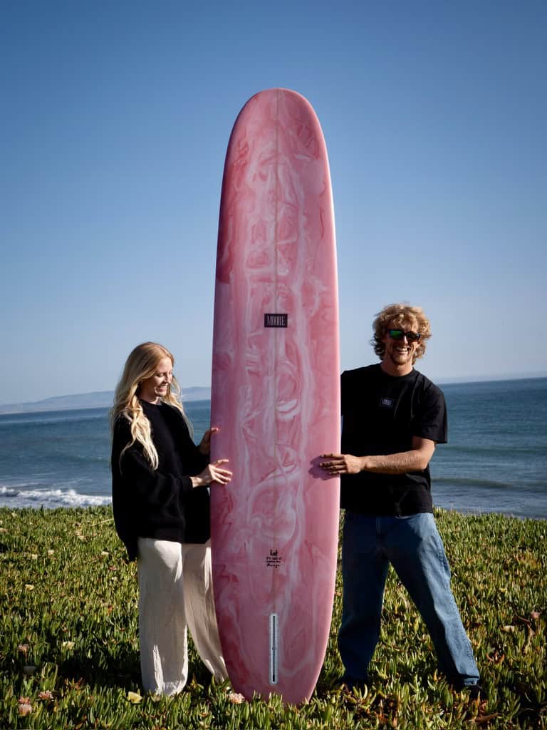 Recent Moore Surf pink longboard